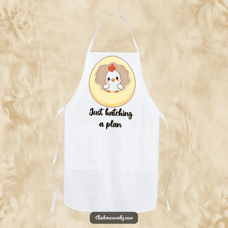 Funny Chicken Apron depicting a curious chick emerging from a giant egg, perfect for kitchen fun and cooking.